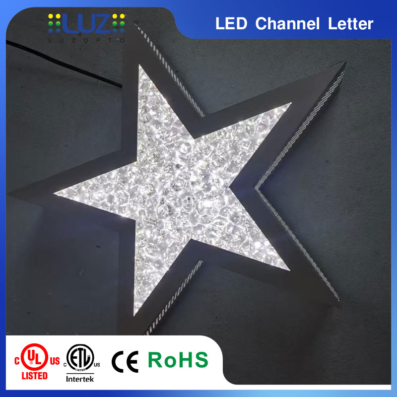 Illuminated star LED channel letter displaying glowing sparkling crushed crystal face effect