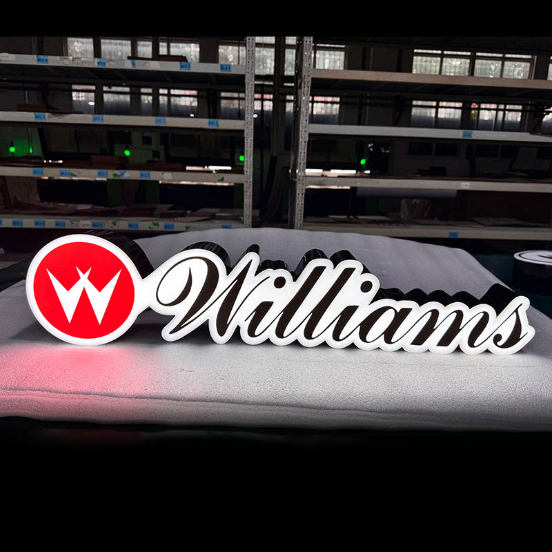 Custom LED Acrylic Logo Signs Williams custom LED acrylic logo sign with black base structure, white script lettering on red circle W logo
